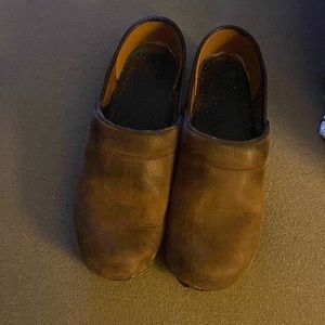 Brown leather clogs